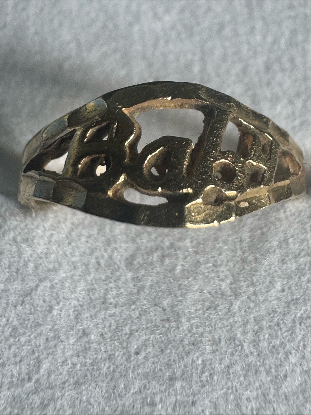 Vintage Baby ring stamped WX 10k fair condition. Shows wear 0.94 grams